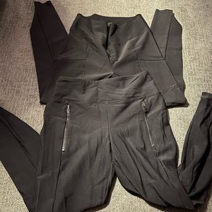 two pairs of black athleta leggings